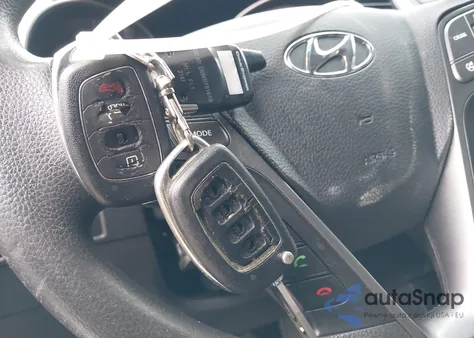 2015 Hyundai Santa Fe Sport 2.4L z USA, uszkodzony, nr VIN 5XYZTDLB8FG261026